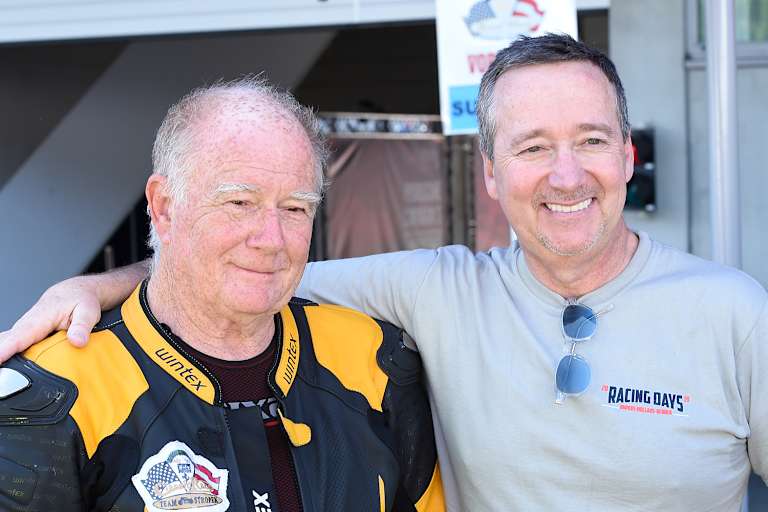 Organisator Wolfgang mit Motorrad-Weltmeister Freddie Spencer