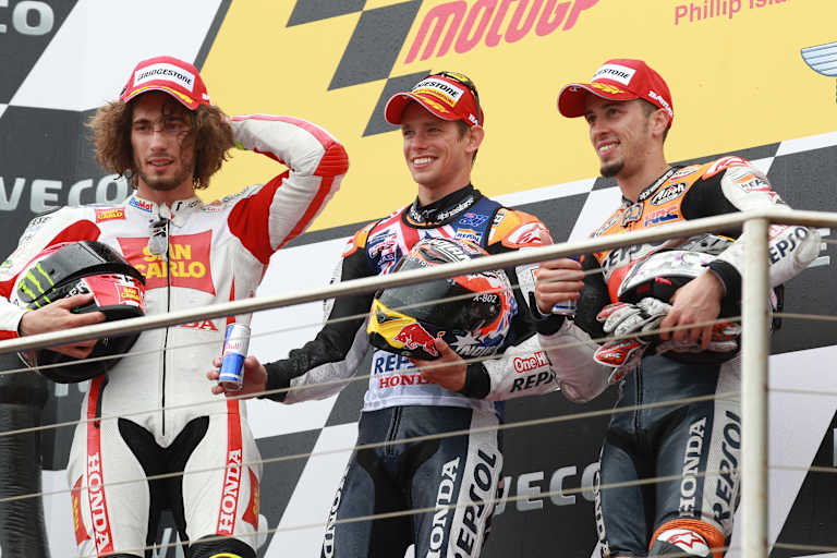 Das Podium beim Australien-GP 2011: Stoner, Simoncelli und Dovizioso