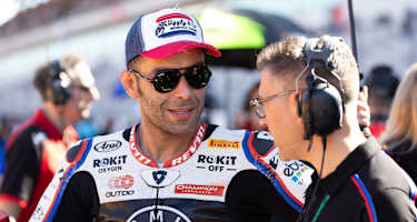 Danilo Petrucci (li.) mit BMW-Technikchef Chris Gonschor