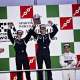 Autopolis 1991: Karl Wendlinger (M. re.) gemeinsam mit Michael Schumacher (M. li.)  beim einzigen Sieg des Mercedes C291