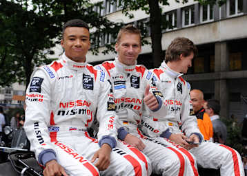Krumm (Mitte) mit Mardenborough und Ordonez in Le Mans 2013