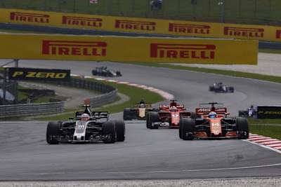 Kevin Magnussen und Fernando Alonso