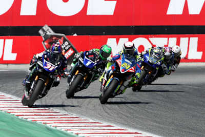 Toni Elias, Roger Hayden und Cameron Beaubier in der Corkscrew-Corner