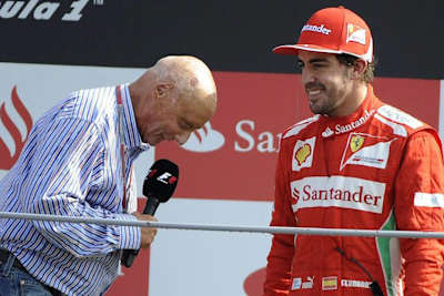 In Monza 2012 zog Niki Lauda vor Fernando Alonso sein Kapperl