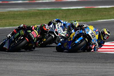 Tom Lüthi (12) im Rennen vor Syahrin (55) und Siméon (10)