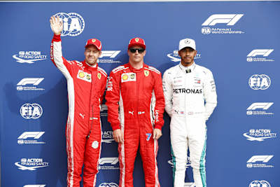 Sebastian Vettel, Kimi Räikkönen und Lewis Hamilton