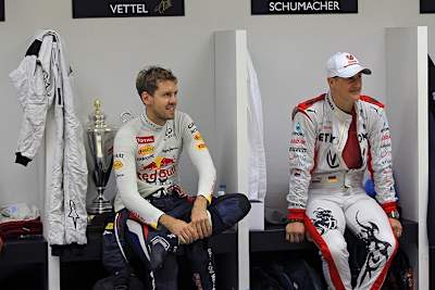 Sebastian Vettel 2012 mit Michael Schumacher