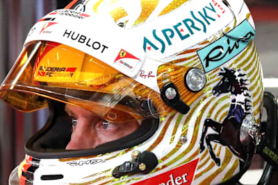 Sebastian Vettel mit orange getöntem Helmvisier