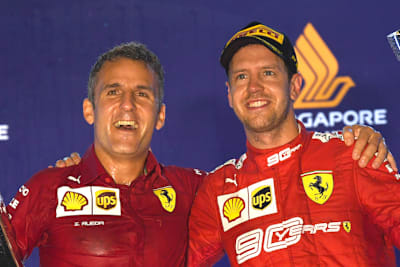 Iñaki Rueda und Sebastian Vettel