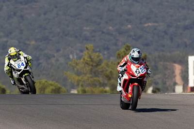 Marcel Schrötter ist WM-Dritter, im Hintergrund Federico Caricasulo