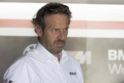 BMW-Rennchef Marc Bongers, links daneben Teamchef Shaun Muir und Scott Redding