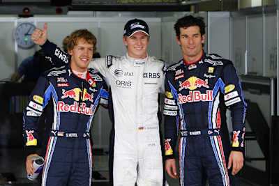 Nico Hülkenberg 2010 in Brasilien mit Sebastian Vettel (links) und Mark Webber (rechts)