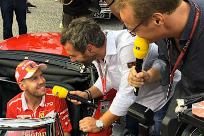 Sebastian Vettel im Gespräch mit Timo Glock