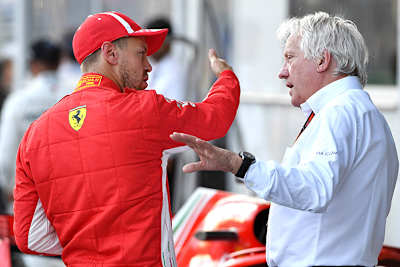 Sebastian Vettel und Charlie Whiting