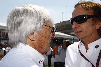 Emerson Fittipaldi (re.) mit Formel-1-Boss Ecclestone