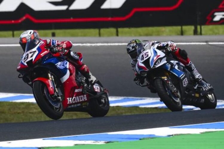 Xavi Vierge vor Scott Redding (BMW)