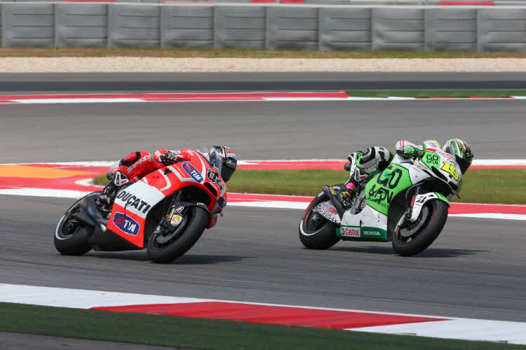 Alvaró Bautista (19) gegen Andrea Dovizioso (4)