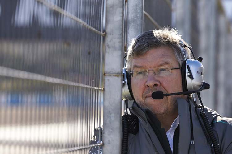 Ross Brawn mit seinen Piloten Lewis Hamilton und Nico Rosberg