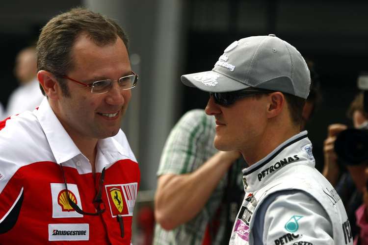 Domenicali beim freundlichen Plausch mit Schumi