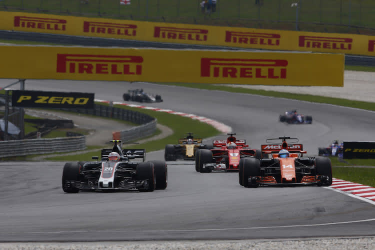 Kevin Magnussen und Fernando Alonso