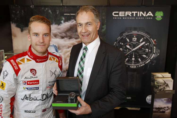 Citroën-Werkspilot Mads Østberg mit Certina-Chef Adrian Bosshard