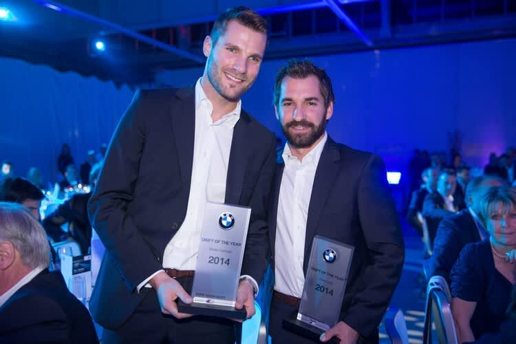 Martin Tomczyk und Timo Glock mit der Auszeichnung