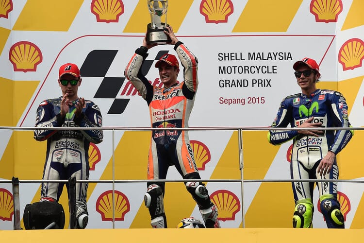 Betroffenheit auf dem Siegerpodest: Lorenzo, Pedrosa und Rossi