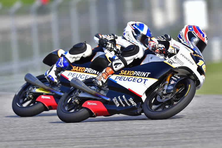 Texas: Alexis Masbou vor seinem Teamkollegen John McPhee