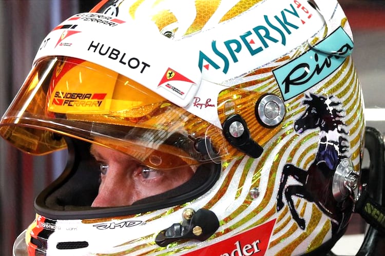 Sebastian Vettel mit orange getöntem Helmvisier