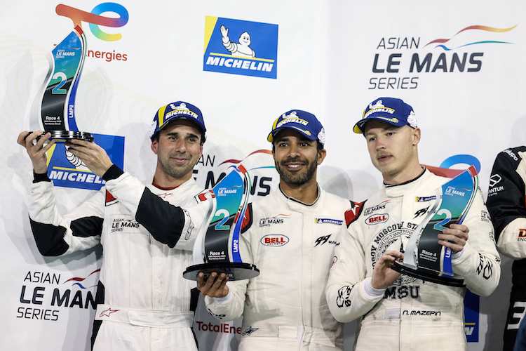 Nikita Mazepin an der Seite von Neel Jani und Ahmad Al Harthy in Abu Dhabi