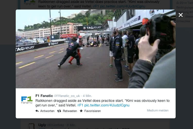 Ein haariger Moment: Kimi Räikkönen wird aus Vettels Fahrtrichtung gezerrt