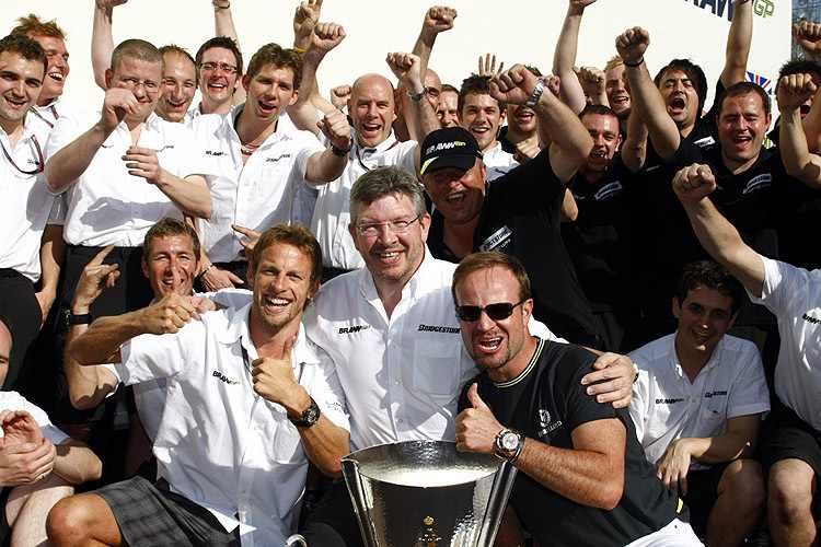 Teamchef Brawn will Button (li.) halten