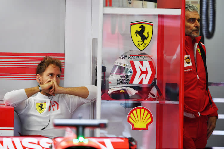 Sebastian Vettel und Maurizio Arrivabene