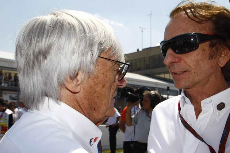Emerson Fittipaldi (re.) mit Formel-1-Boss Ecclestone