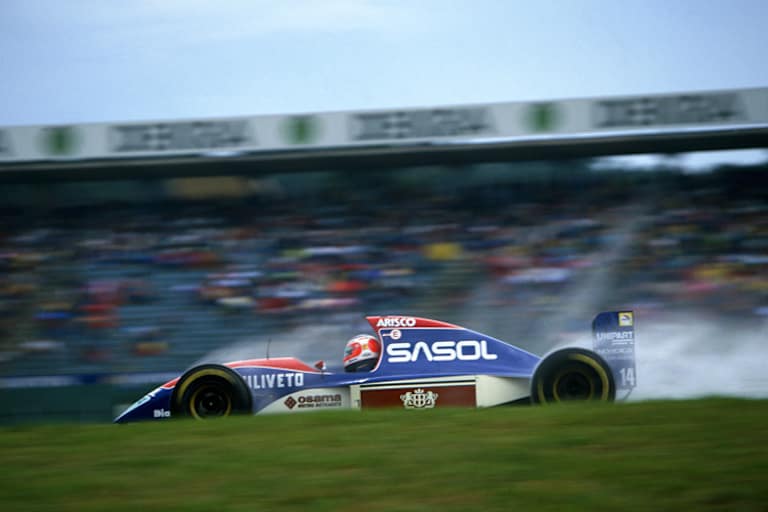 Rubens Barrichello im Regen von Hockenheim 1993. Auf der Tribüne – ein gewisser Sebastian Vettel