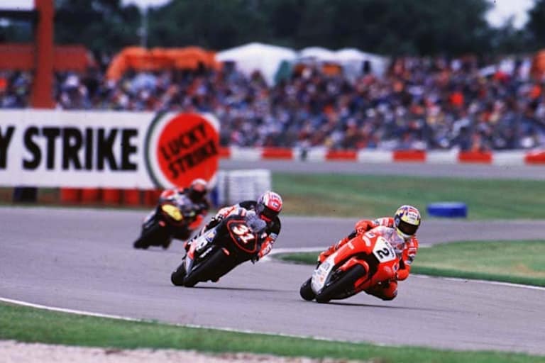 Assen-GP 1997: Ralf Waldmann führt vor Tetsuya Harada