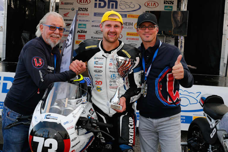 Höfer (Mitte) mit der Chefetage Wilbers und Beyer