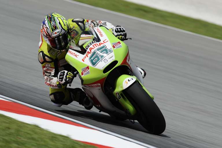 Loris Capirossi 2011 auf der Pramac-Ducati mit Nummer 65