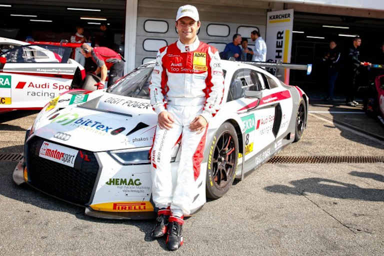 Pierre Kaffer vor dem Audi R8 LMS der Audi Sport racing academy