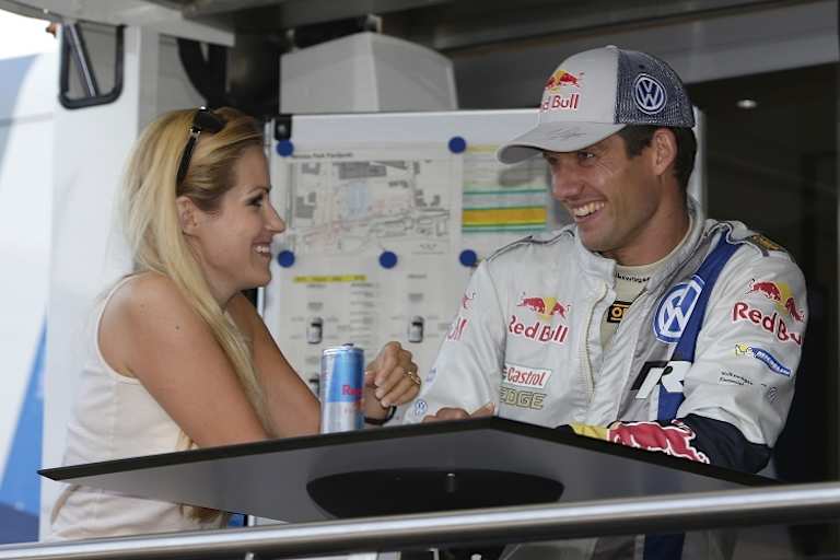 Andrea Kaiser (li.) und Sébastien Ogier 2014 in Finnland