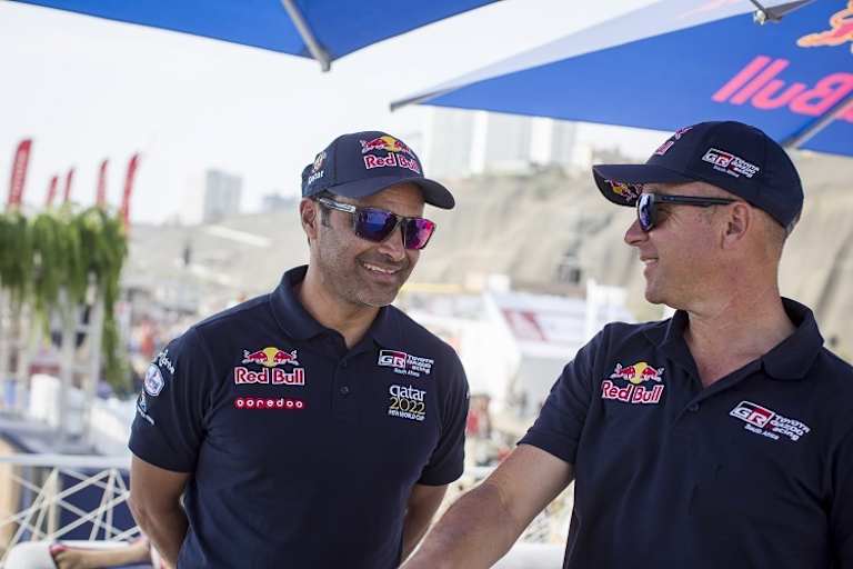 Nasser Al-Attiyah (l.) und Giniel de Villiers