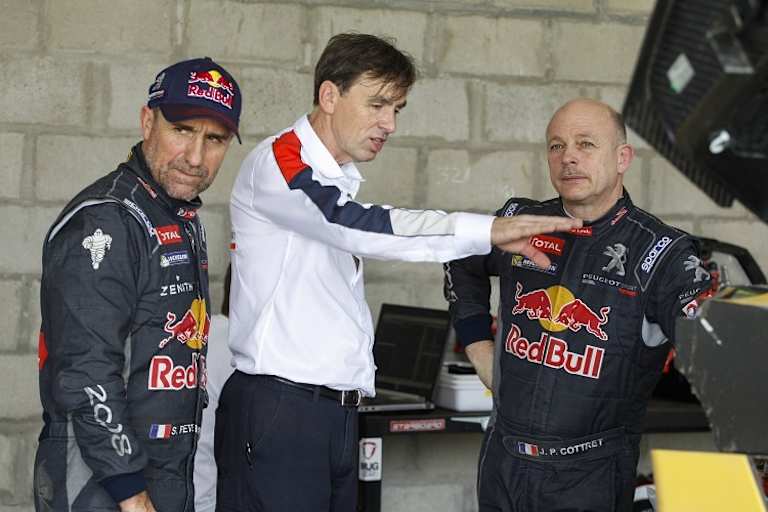 Stéphane Peterhansel (l.) und sein Beifahrer Jen-Paul Cottret (re.)
