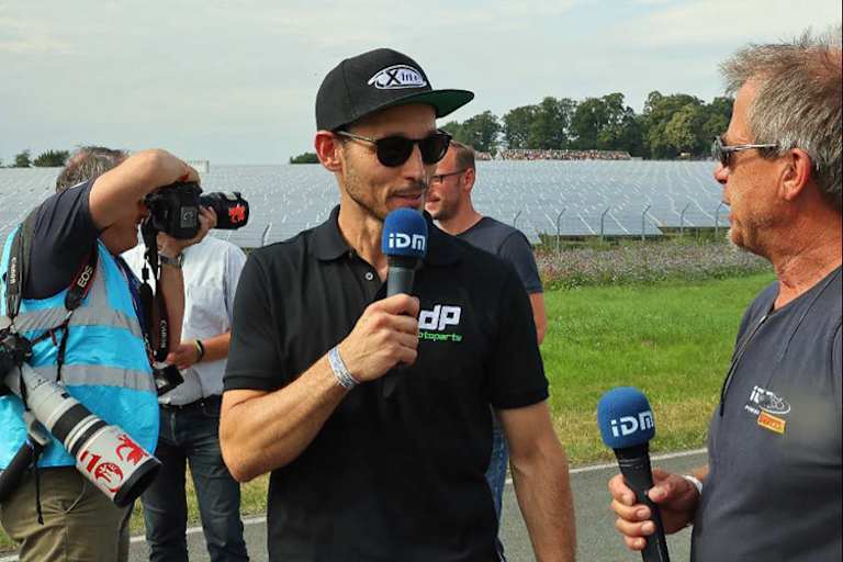 Peric bei der IDM am Mikro