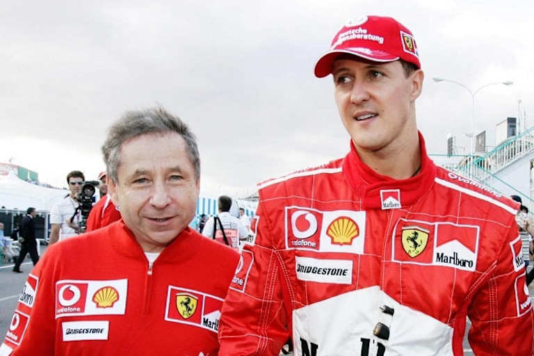 Ferrari-Rennleiter Jean Todt mit Michael Schumacher