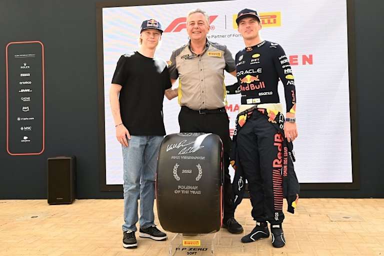 Kalle Rovanperä, Mario Isola (Pirelli), Max Verstappen