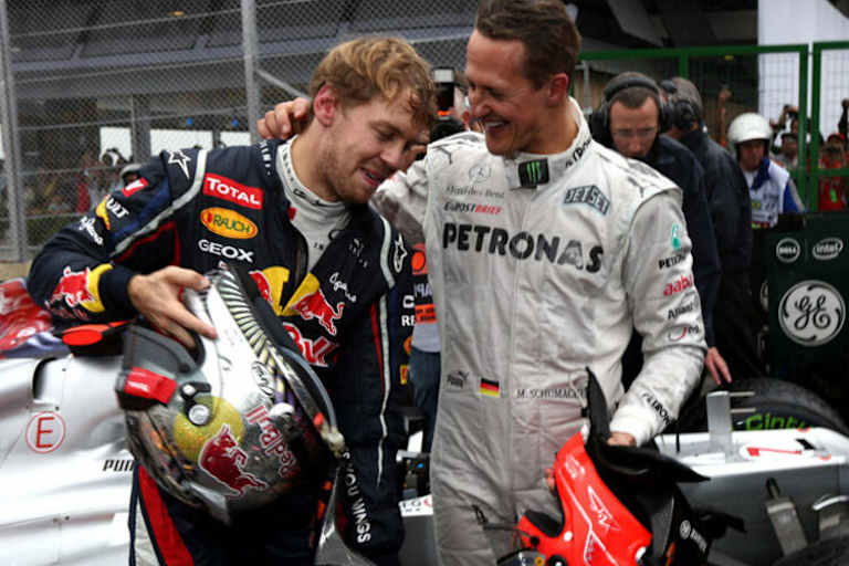 Sebastian Vettel mit Michael Schumacher