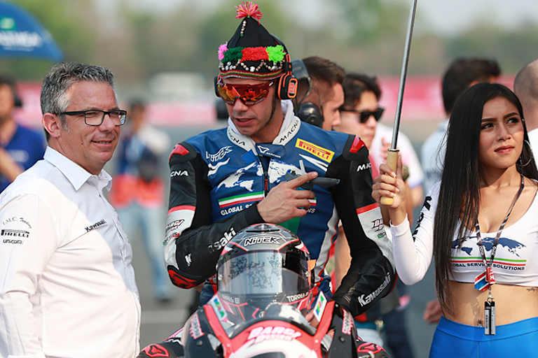 Teamchef Lucio Pedercini (li.)